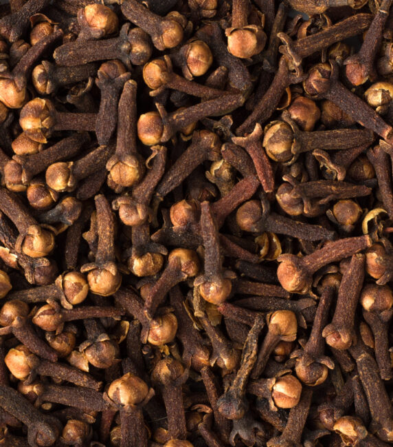 texture of dry cloves close-up, spice or seasoning as background