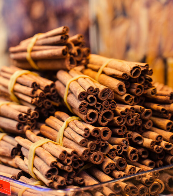 Cinnamon sticks cassia aromatic spice Turkish market. Seasoning for mulled wine and desserts.